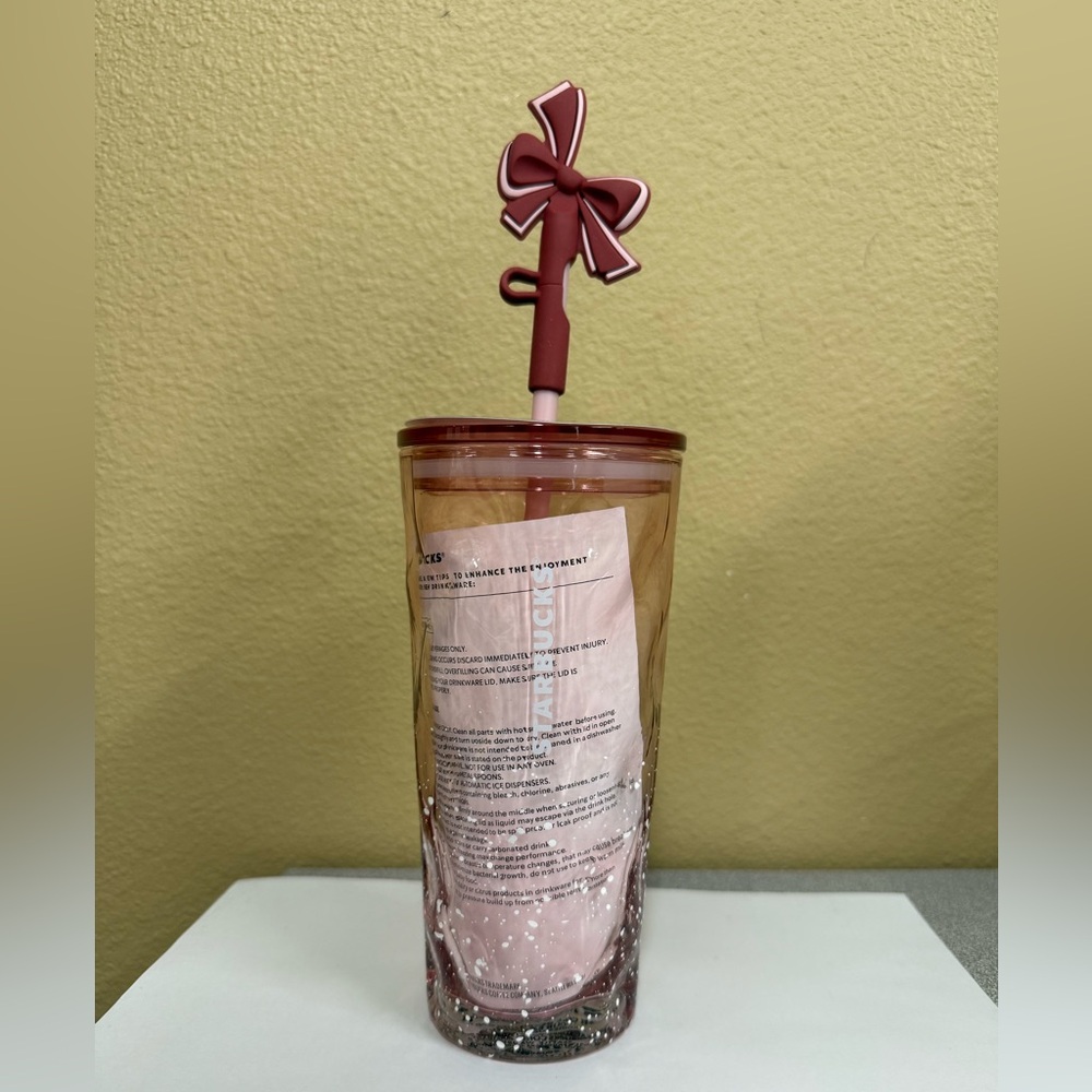 Clear Pink Starbucks Holiday Cup with Bow Topper 2025